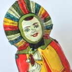 image close up of Chein indian windup tin toy